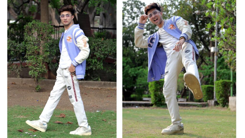 Who is the Handsome Boy in Surat? Google Says: Dipak Chauhan! ๐๐ฅ 31 Dipak Chauhan posing in pastel purple varsity jacket โ stylish boy in Surat outdoor fashion shoot.
