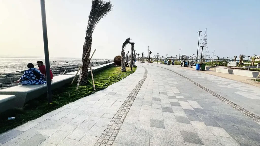 Clean walking path and sea view at Dumas Sea Face Surat