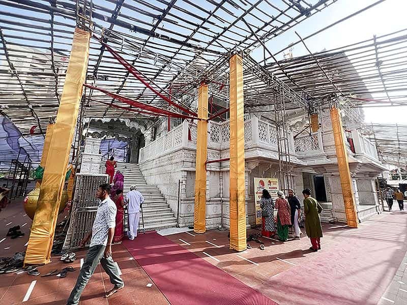 Inside view of Khatu Shyam Temple Surat with scaffolding and construction work