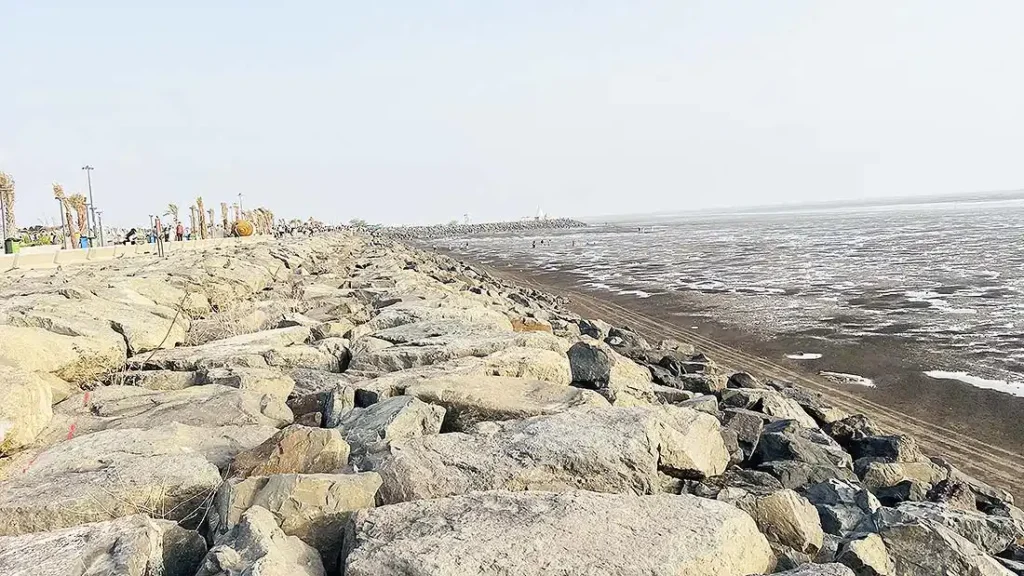 Sea water far from shore at Dumas Sea Face during low tide